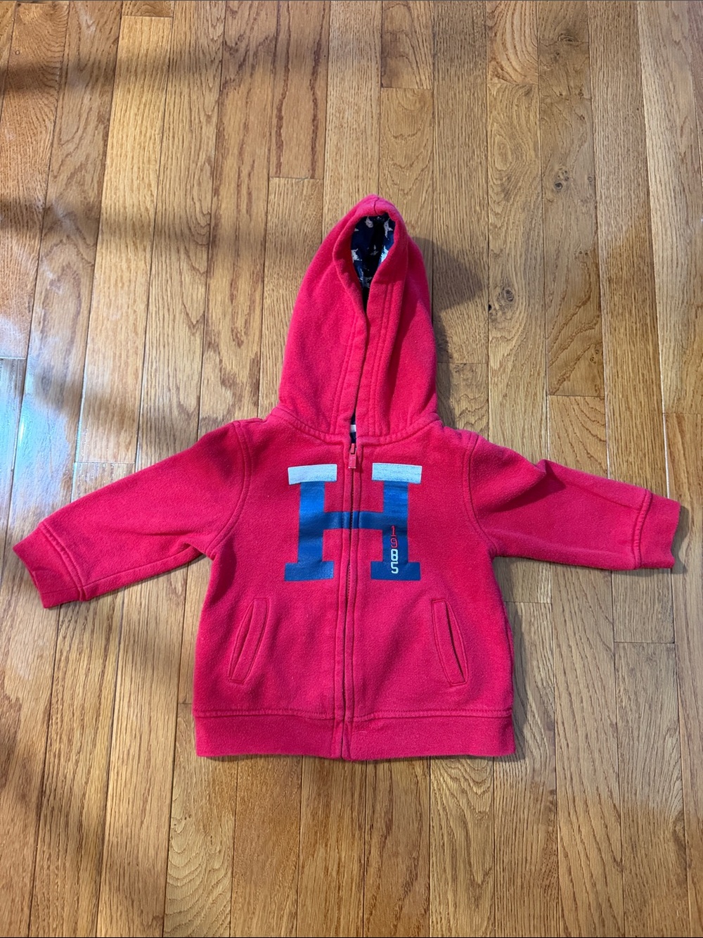 Tommy Hilfiger 12M Red Hooded Zip-Up Sweatshirt with Blue 'H' Graphic